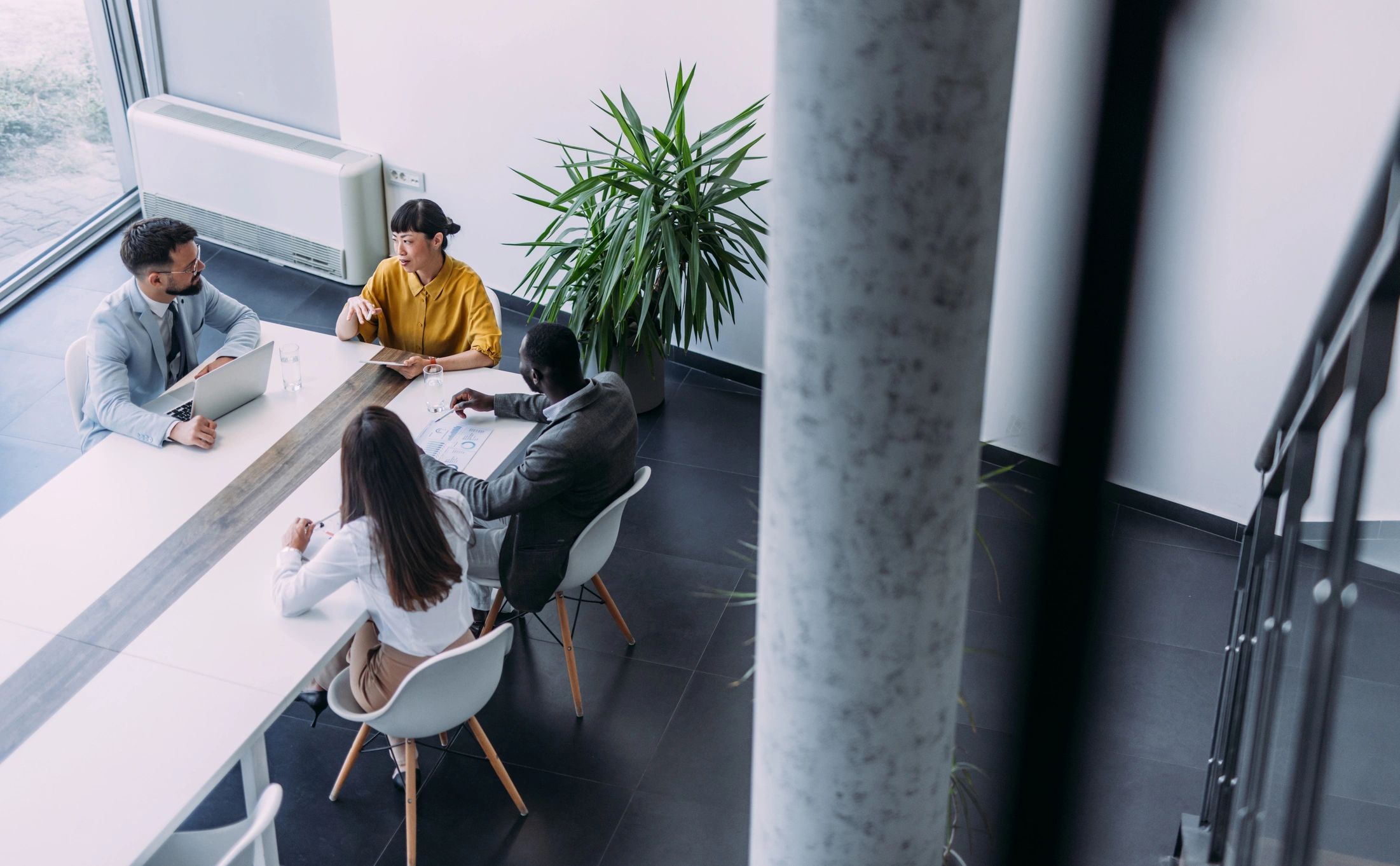 Professional team collaborating in meeting room